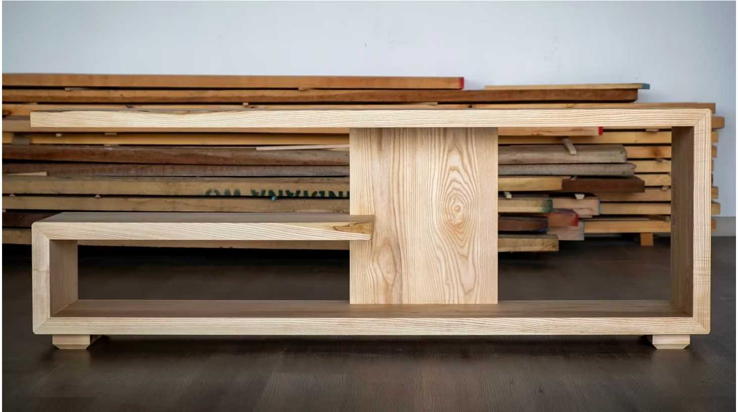 A bespoke ash TV stand designed to perfectly fit our client’s space.