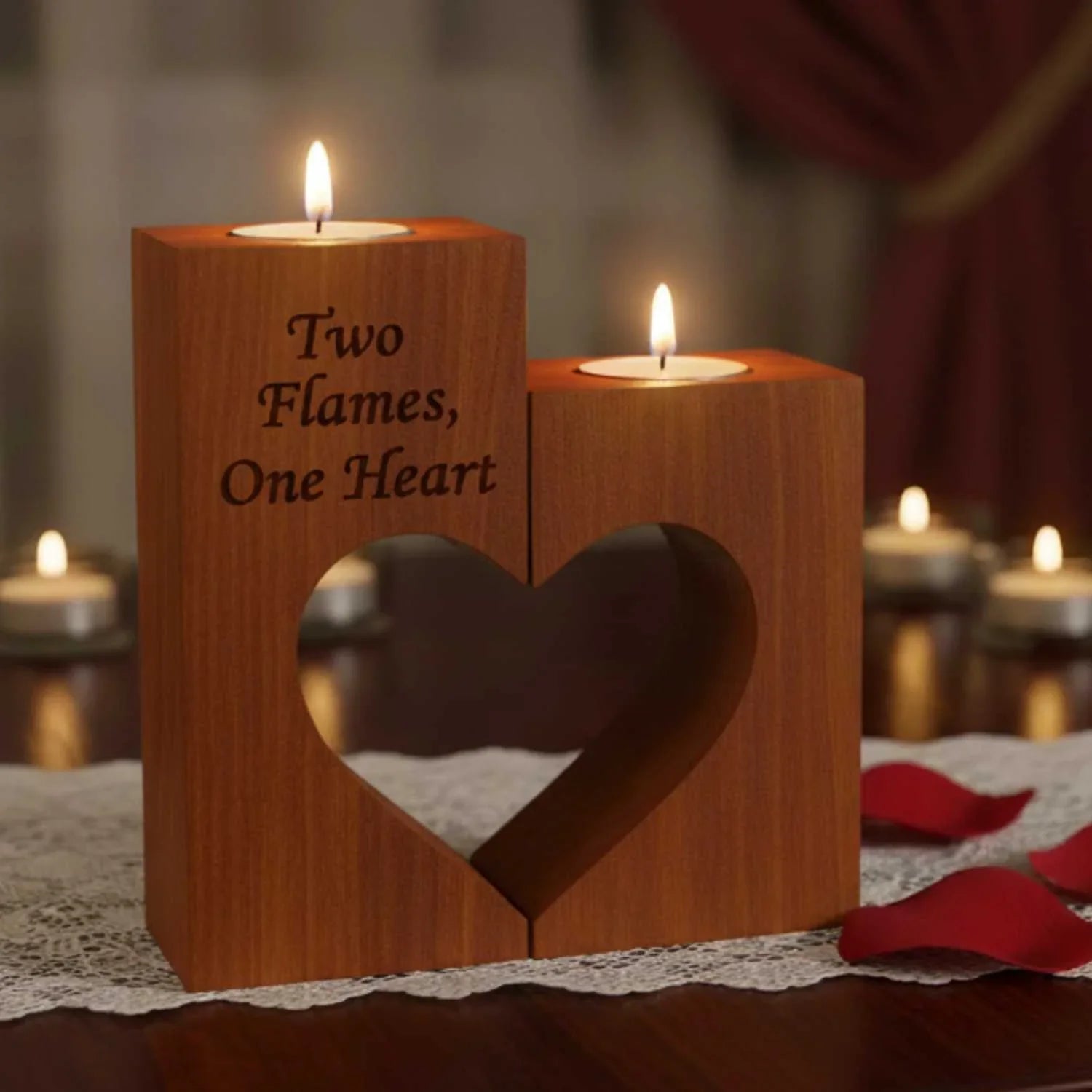 Wooden dual candle holder with heart-shaped center and engraved text 'Two Flames, One Heart' on lace cloth