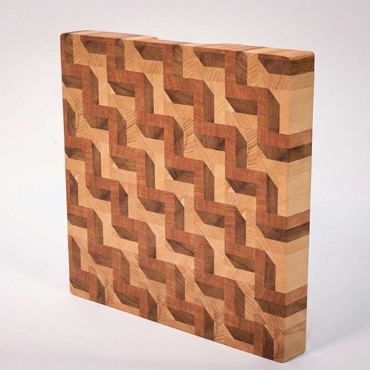 Handcrafted wooden cutting board with geometric 3D inlay pattern, premium kitchen decor