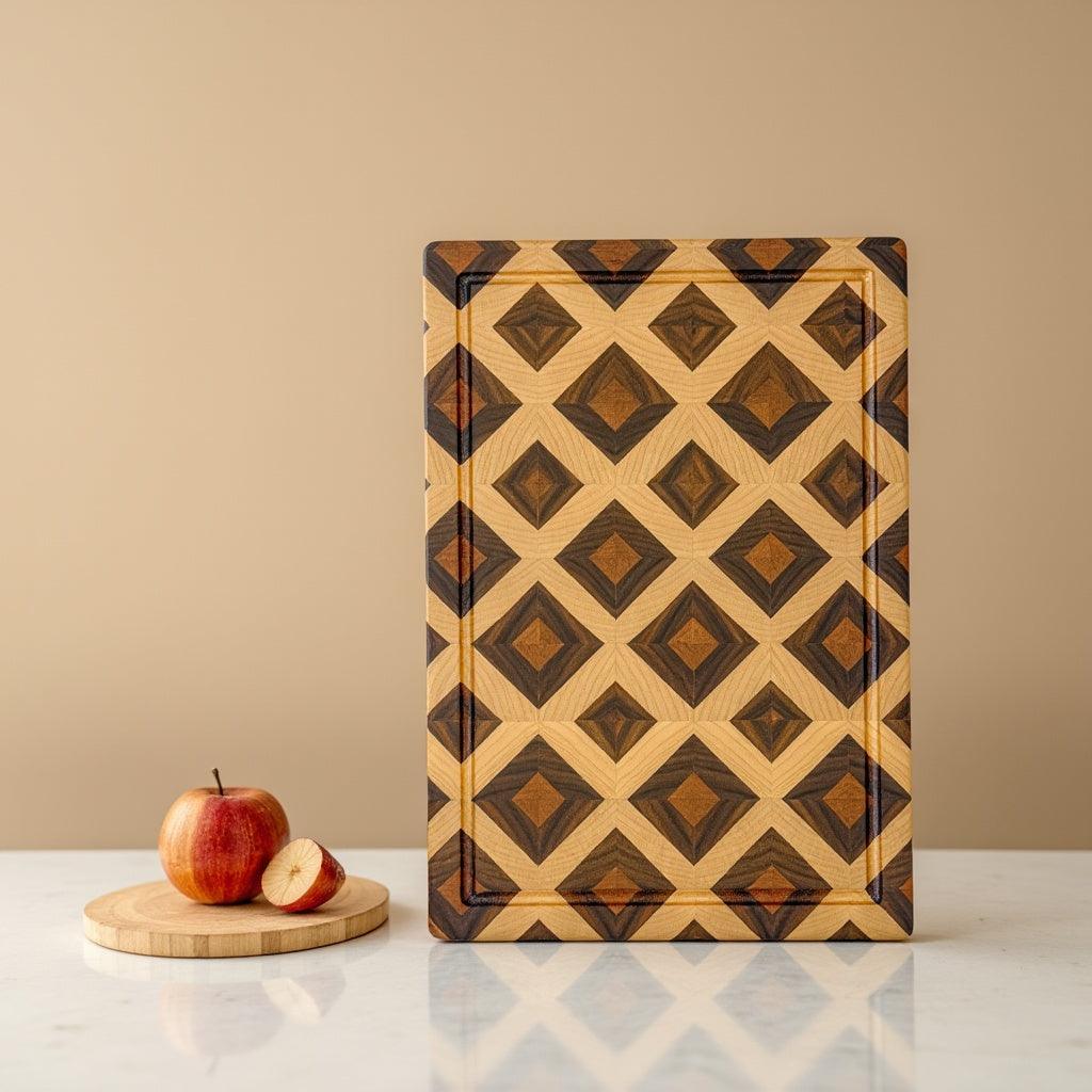Diamond patterned wooden cutting board with geometric design on marble surface next to sliced apple on round wood coaster