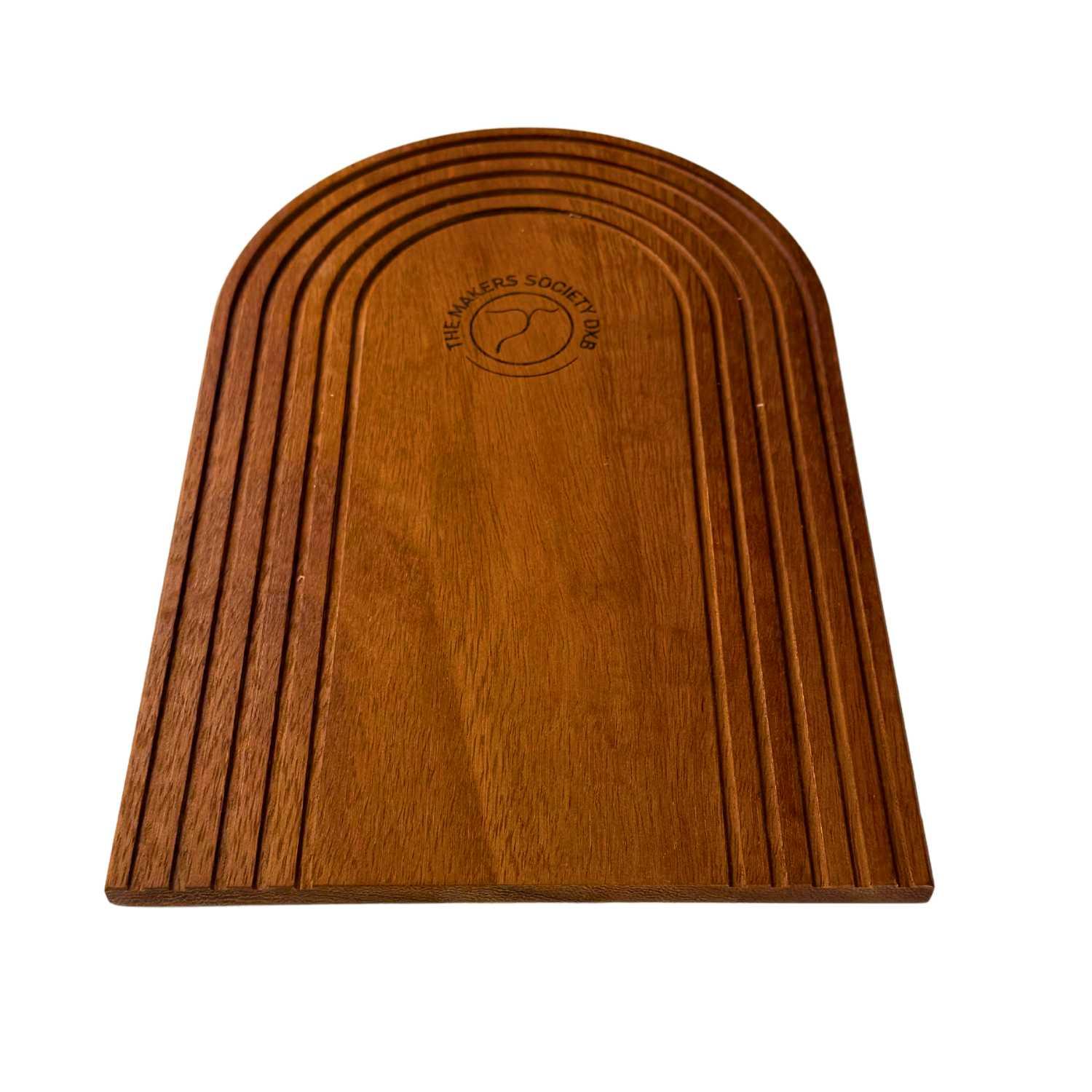 Handmade wooden grooved tray with rounded top and The Makers Society logo engraving