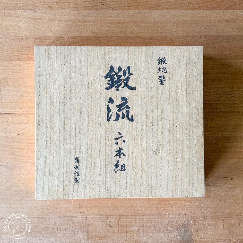 Wooden box with Japanese calligraphy containing six-piece highest grade Damascus woodworking chisels
