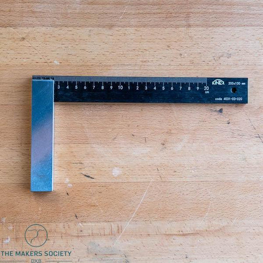 Kine square metal woodworking ruler 200x130mm on wooden surface from The Makers Society