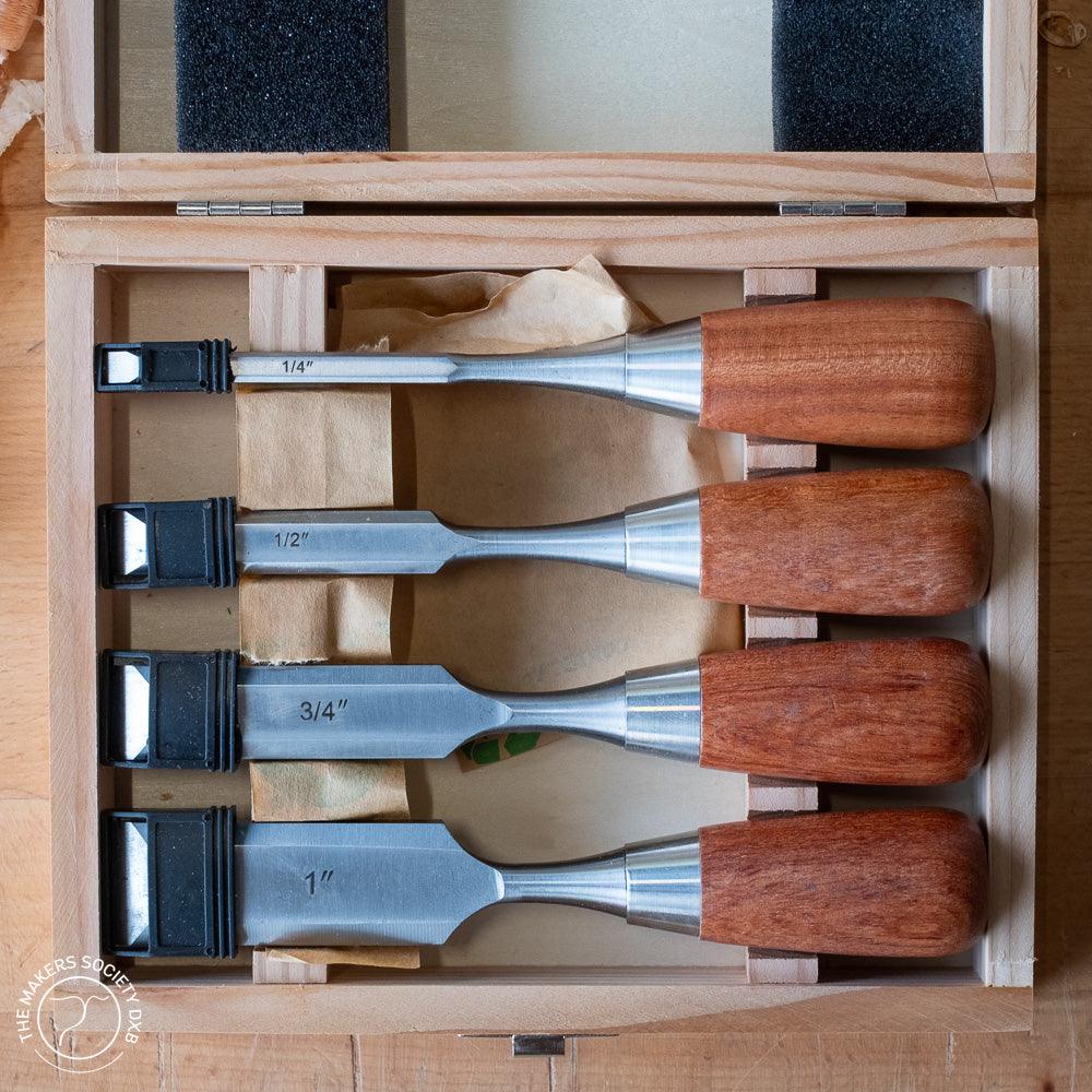 Set of four Luban butt chisels with wooden handles in a wooden box, sizes 1/4, 1/2, 3/4, and 1 inch