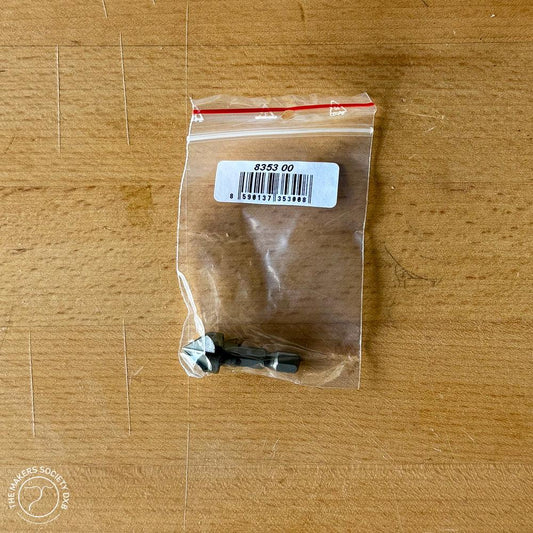 Small Narex conical countersink drill bit in clear plastic bag on wooden surface