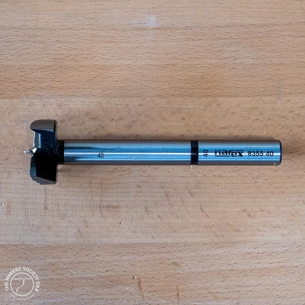 Narex 40mm Forstner bit for woodworking on wooden surface, premium cutting tool