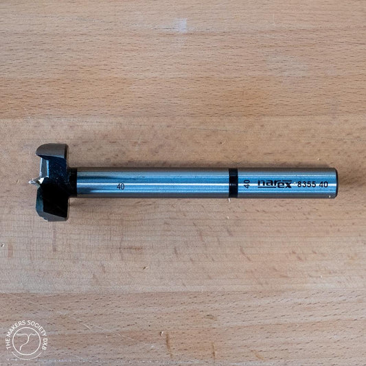 Narex 40mm Forstner bit for woodworking on wooden surface, premium cutting tool