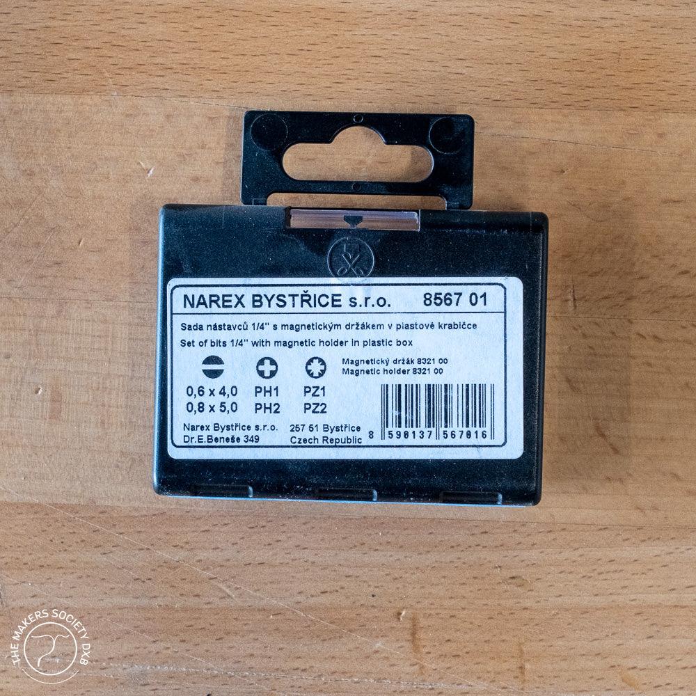 Narex Bystřice 7-piece 1/4" bit set with magnetic holder in black plastic box on wooden surface