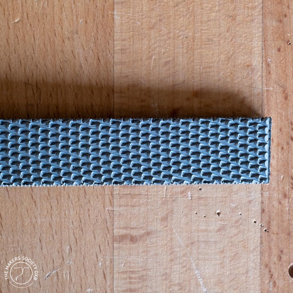 Close-up of a 200mm wood rasp with textured coarse teeth on wooden surface, set of 3 rasps