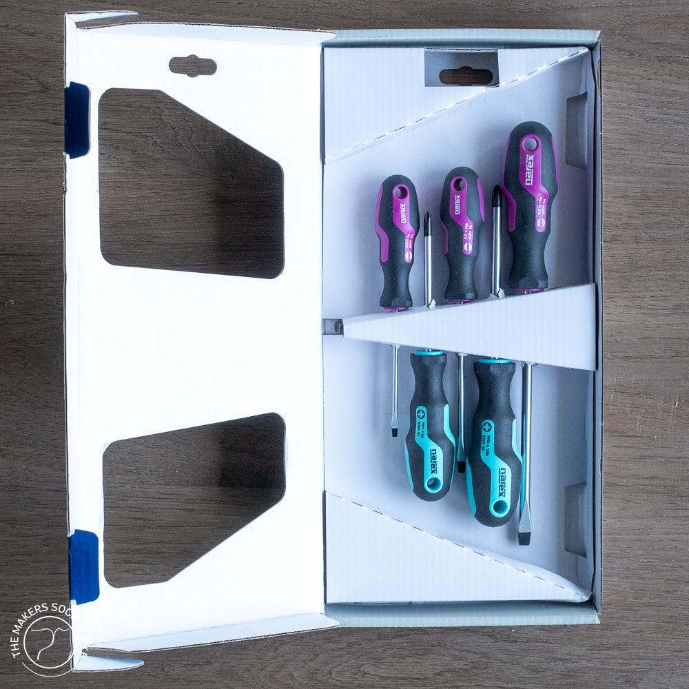 Narex screwdriver set with ergonomic black handles in purple and teal, in white packaging on wood surface