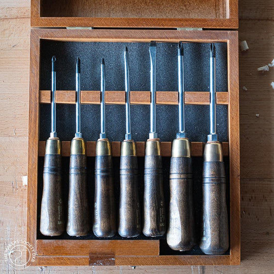 7-piece Narex wooden handle screwdriver set in wooden box on a workbench, premium woodworking tools