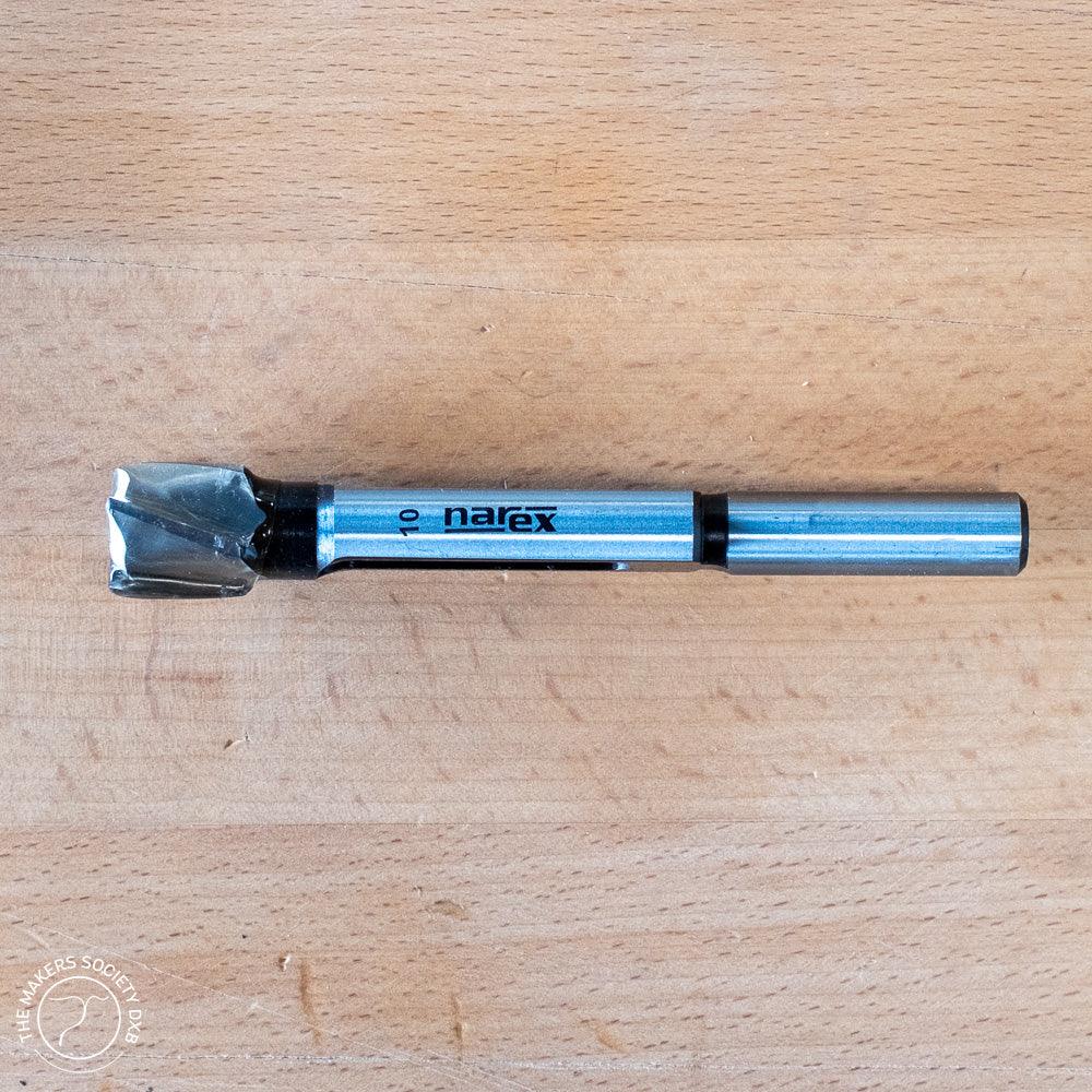 Narex 10mm tenon plug cutter woodworking drill bit on wooden surface