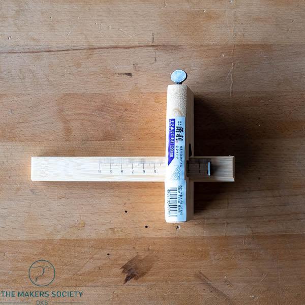Kakuri marking gauge with 120mm blade on wooden surface, precision woodworking tool from The Makers Society
