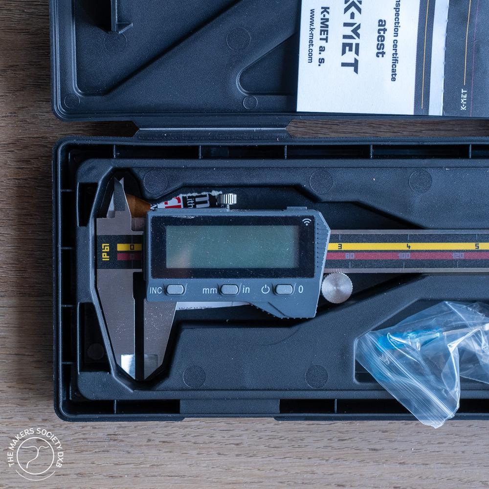 K-MET digital caliper with IP67 waterproof rating and Bluetooth, housed in black protective case