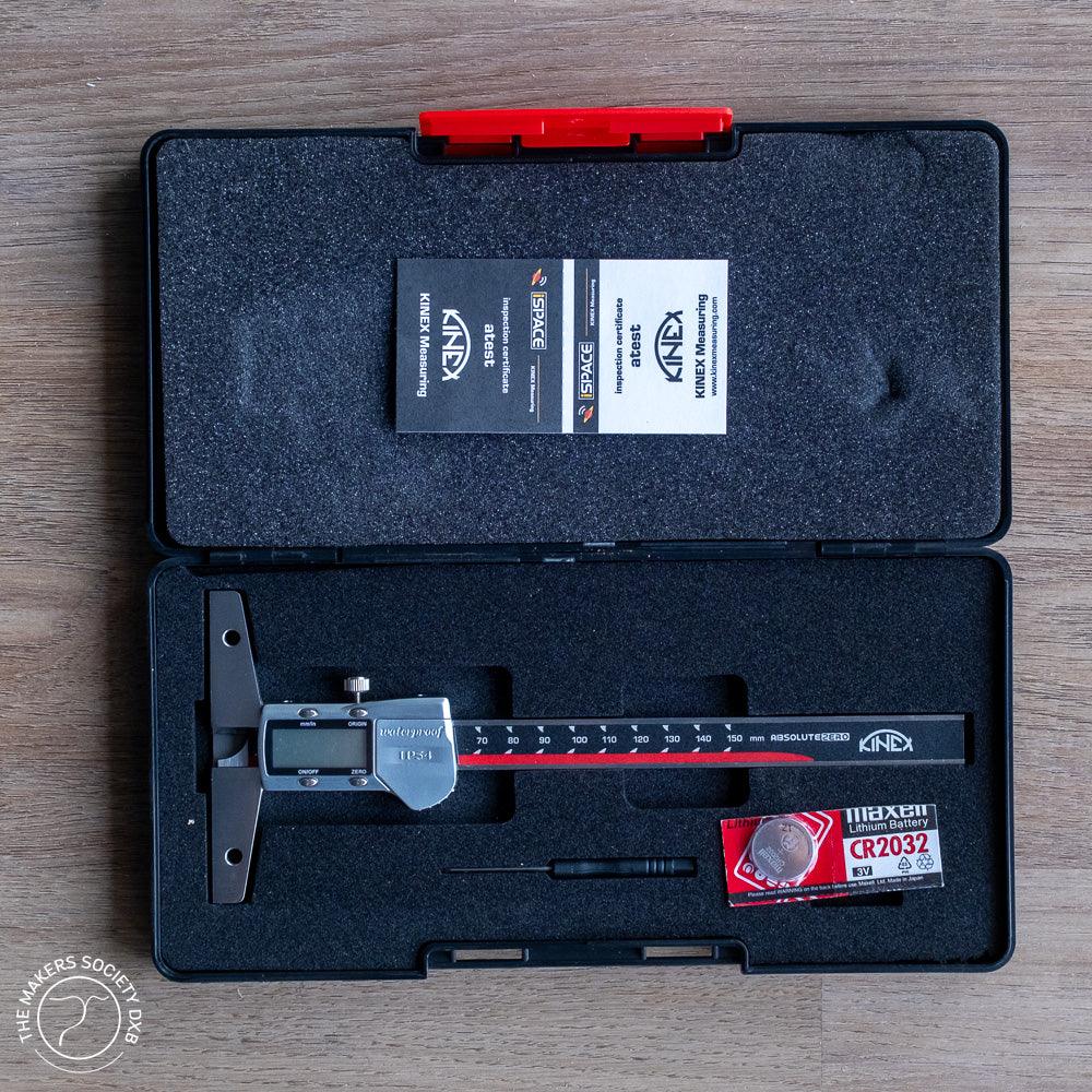 KINEX digital depth caliper in foam case with calibration certificate, small screwdriver, and CR2032 battery