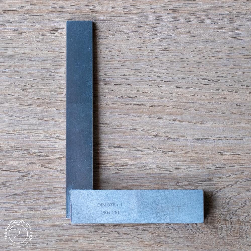 Precision universal square 150x100mm woodworking tool on wooden surface