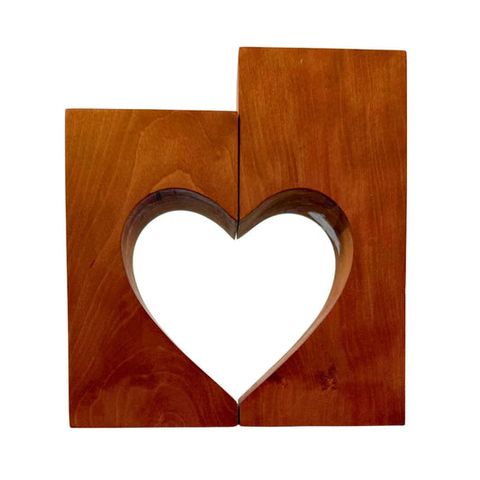Handcrafted wooden wall art with two rectangular panels forming a heart-shaped cutout
