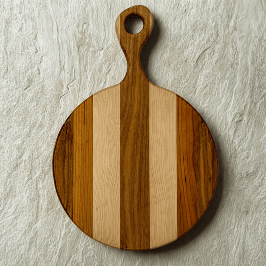 artisan striped round wooden cutting board with handle on textured white surface