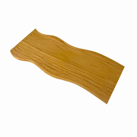 Handmade wave-shaped wooden serving board with natural grain pattern on white background