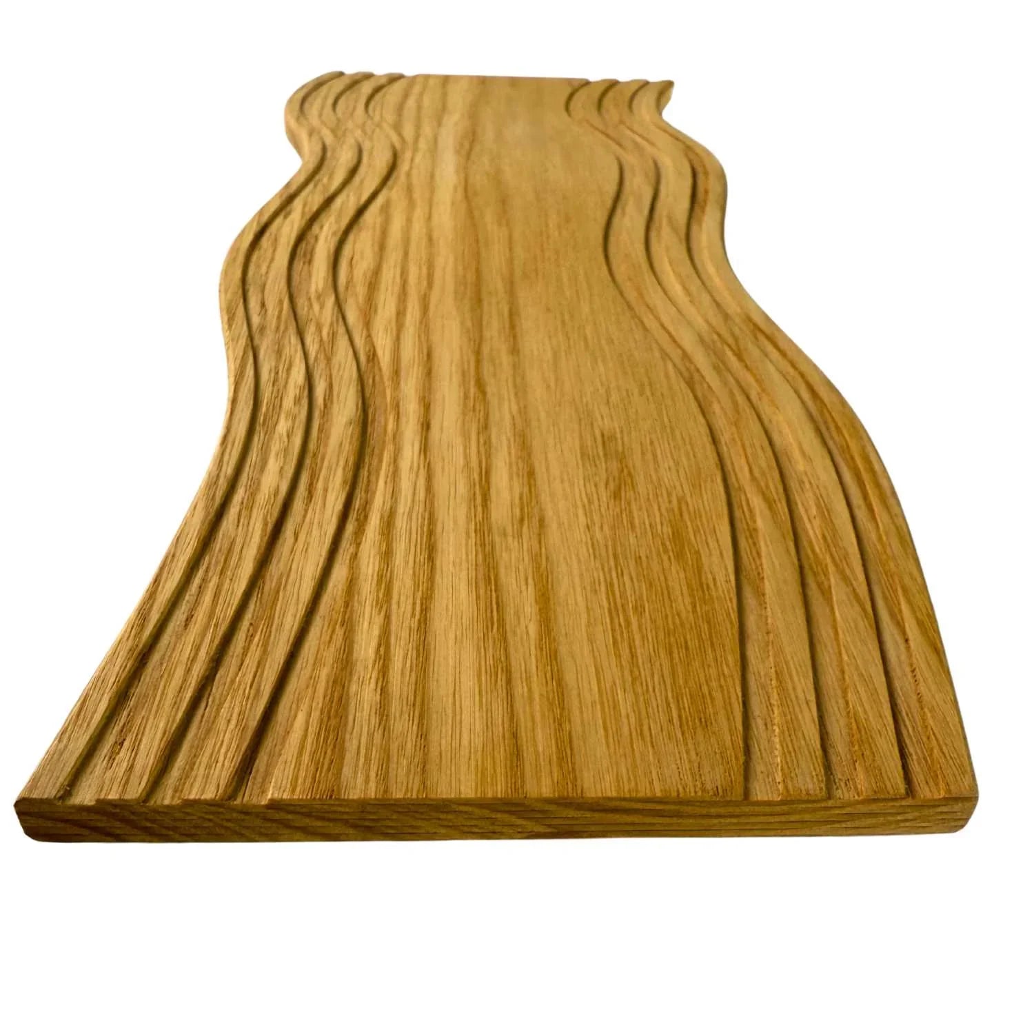 Handmade wave wooden serving board with carved flowing grooves in natural oak wood