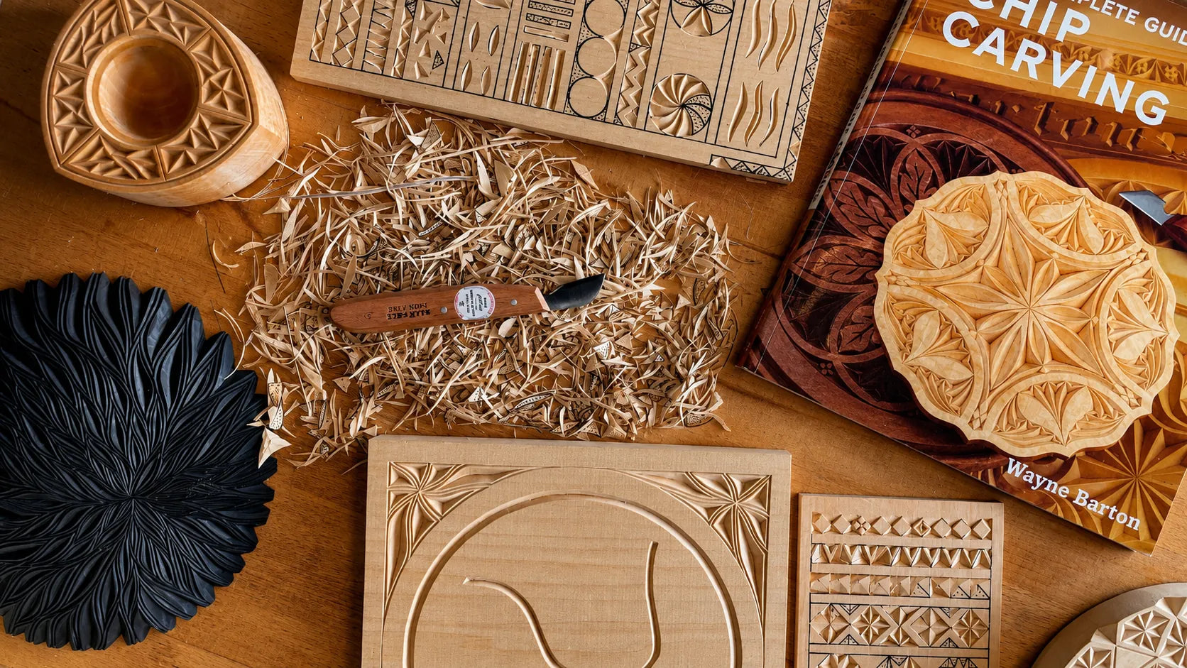 Chip carving tools, carved wooden studies and reference book