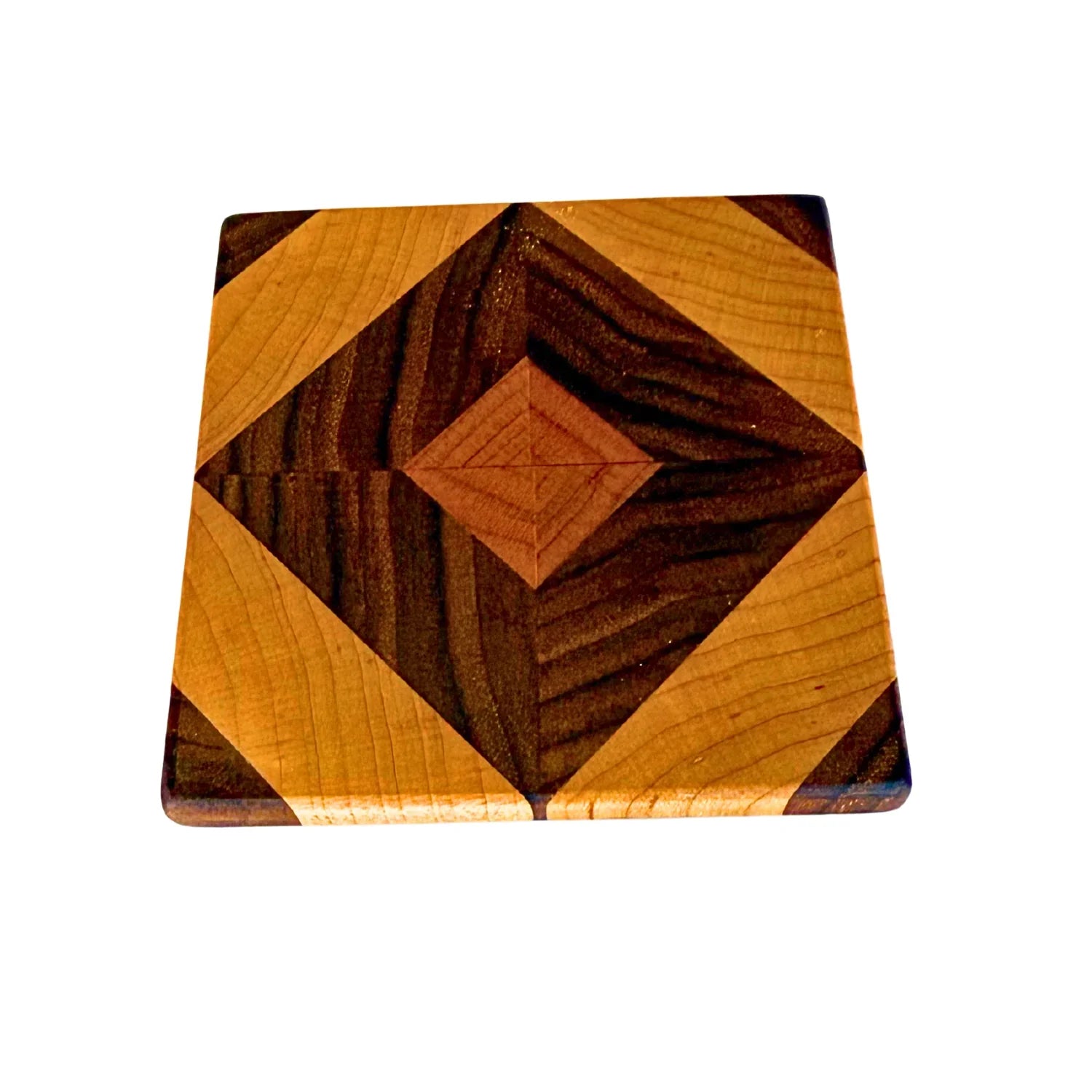 Handmade wooden coaster with geometric diamond pattern in light and dark wood tones