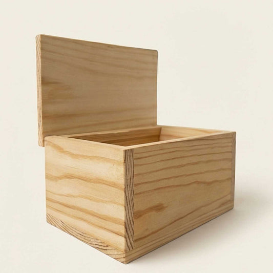 A premium handmade light-wood storage box with an open lid, shown from a three-quarter angle on a clean, off-white studio background with soft lighting.
