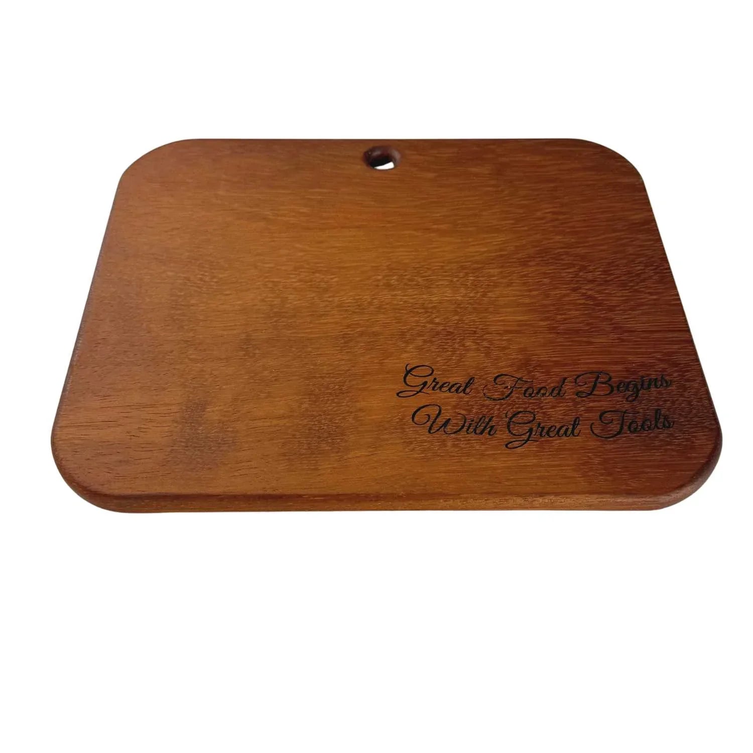 Rectangular Iroko wood serving board with rounded corners and engraved text 'Great Food Begins With Great Tools'