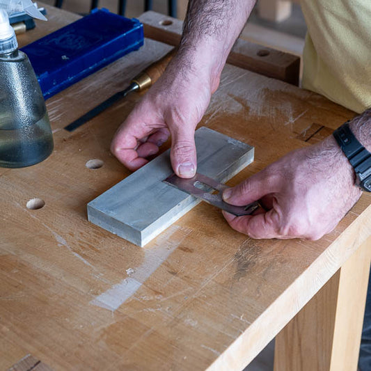 Close-up of chisel back flattening as part of a woodworking sharpening lesson at The Makers Society.
