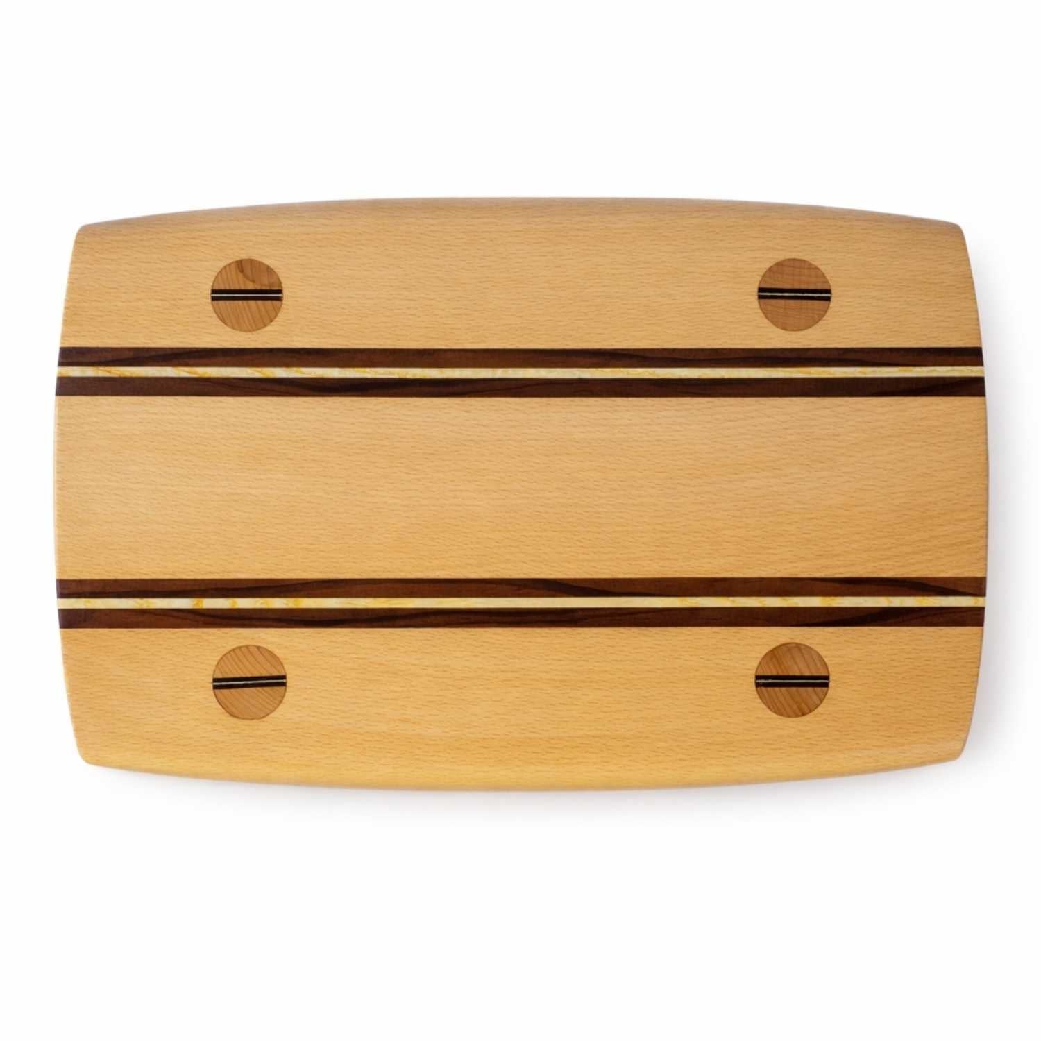 Top view of a handcrafted wooden stool seat with contrasting wood inlays, showcasing traditional joinery techniques by The Makers Society in Dubai