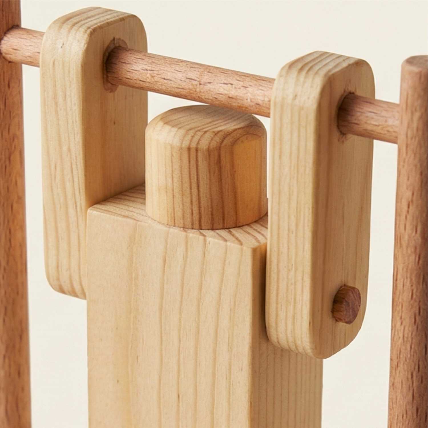 Close-up of handmade wooden acrobat toy, natural wood finish, The Makers Society Dubai