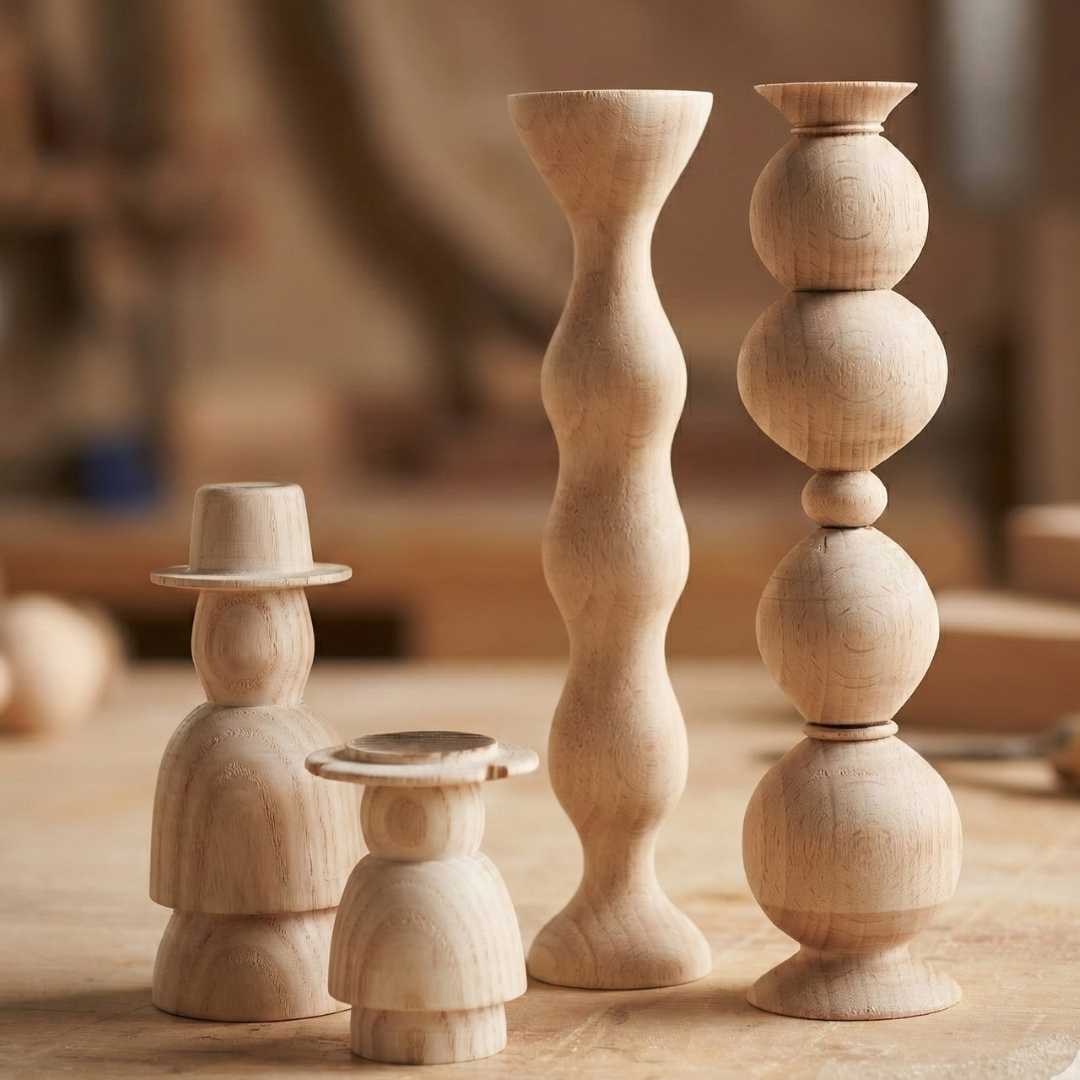 Turned wooden spindle samples showing different profiles made in a beginner woodturning class at The Makers Society in Dubai.